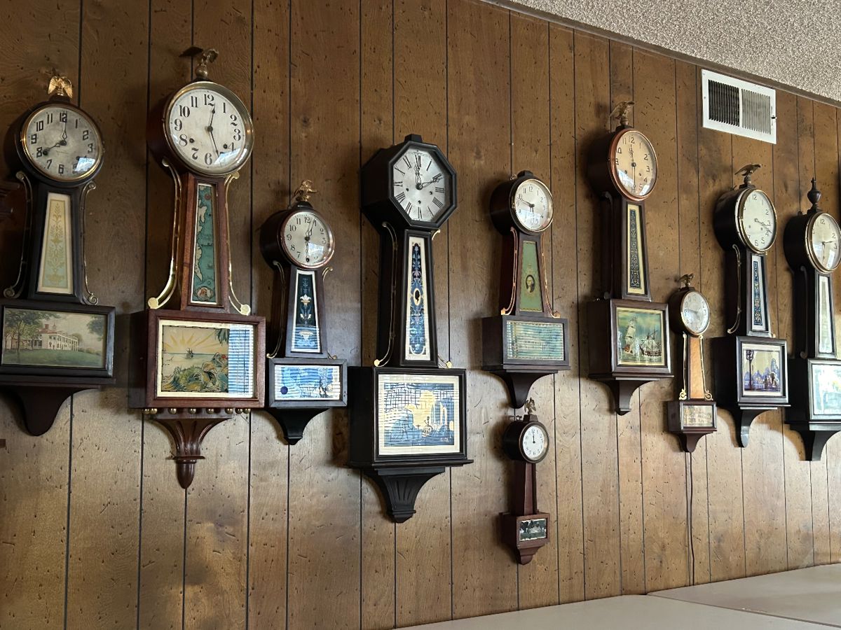 Over a dozen banjo clocks.
