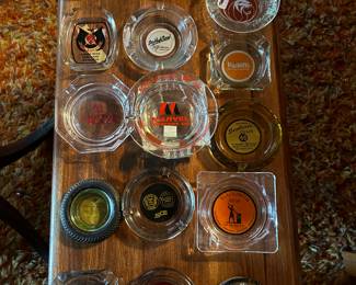 Large collection of vintage ashtrays.
