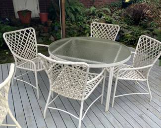 $220 Brown Jordan table and four chairs. Table is 42" round x 25.5"h. Chairs are 22"w x 24"d x 31"h at the back.