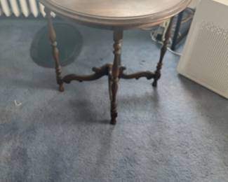 $30. demilune table 24"w x 11.5"d x 24"h