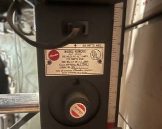 manufacturer's plaque on the photo enlarger.
