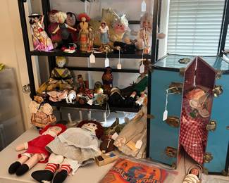 Part of the doll collection for sale during in-person sale Friday & Saturday.