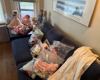 Part of the doll collection for sale during in-person sale Friday & Saturday.