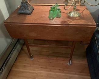 $120 Drop leaf table - great extra seating or console table.
35"w x 20" d x 29.5"h with sides down. With sides up the table becomes a square.