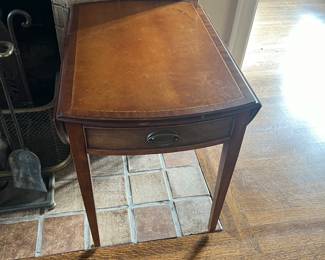 $90 One of a pair of mahogany end tables with drop leaf sides. as found