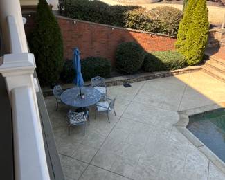 OUTDOOR IRON TABLE AND CHAIRS WITH UMBRELLA