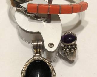 Look at this coral sterling and other bracelets