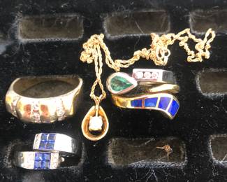 14k and Platinum With diamonds sapphires emeralds and opals