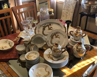 Fabulous oriental China set with Lady faces in the cup