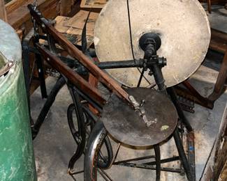 pedal saw and sharpening wheel