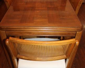 Beautiful table with 4 chairs/ 1 leaf. Glass protection top