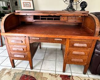 Roll top opened so you can see the cubbies