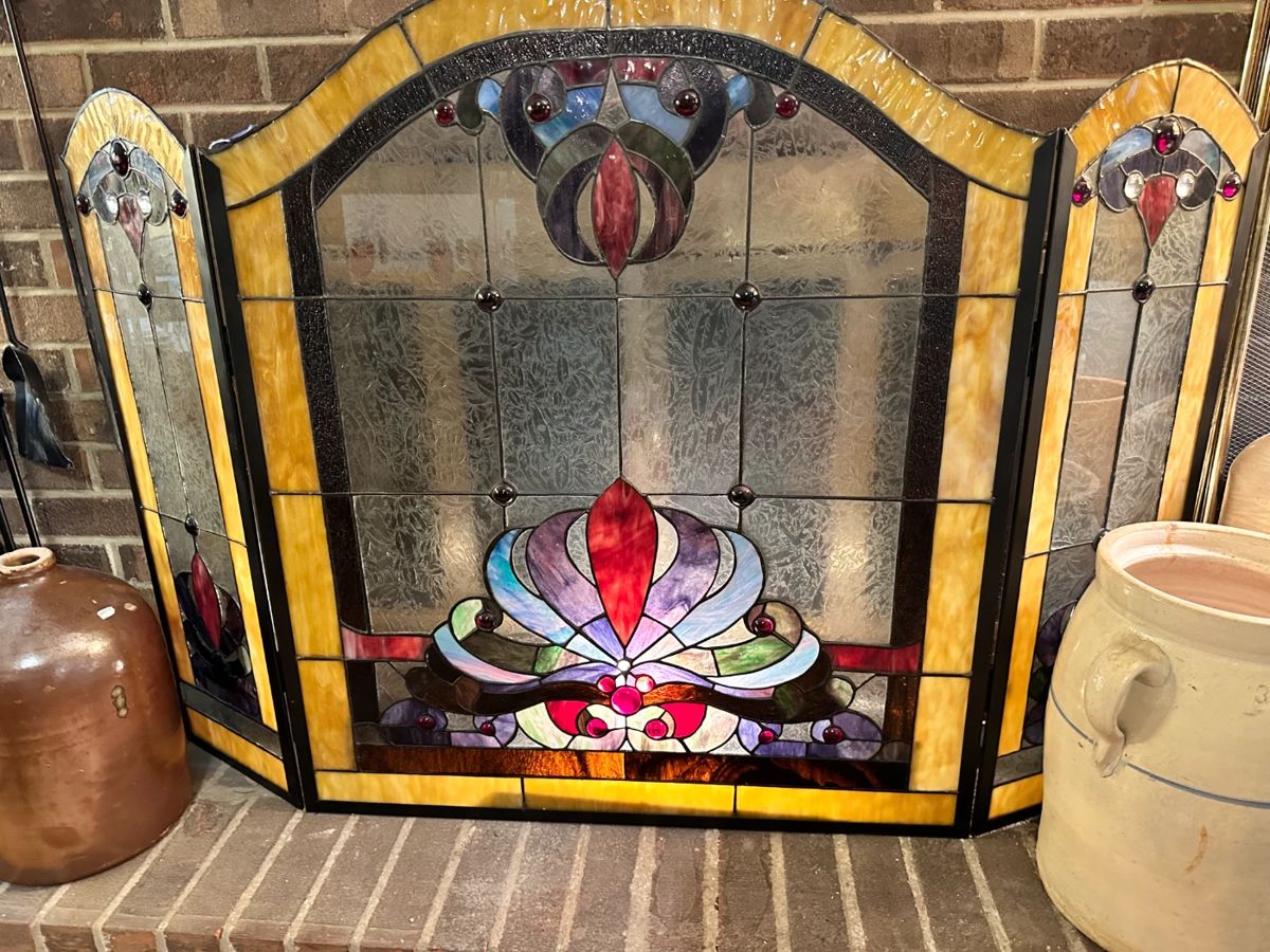 Stained glass fireplace screen. 