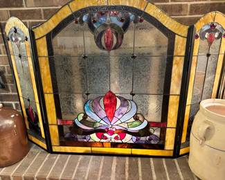 Stained glass fireplace screen. 
