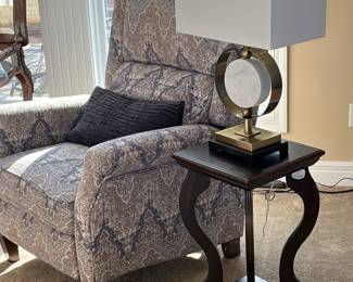 Modern table lamp on vintage dark wood side table