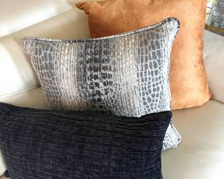 Assortment of designer pillows