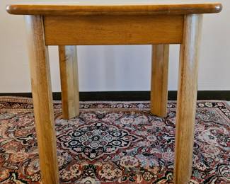 One of two wood end tables