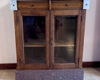 Small buffet or sideboard on granite base w/marble top