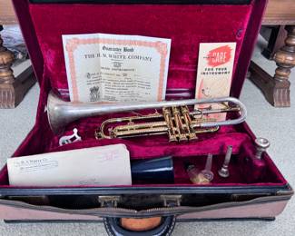 The H.N. White Company "King" trumpet w/original case, certificate of authenticity and care guide.