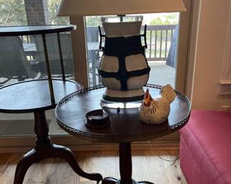 Two tripod vintage side tables. One with adjustable top level.