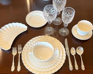 "Chelsea Wicker" by Spode 12 crescent salad or sandwich dishes, 12 bread plates, 13 cream soup and under plates, 11 salad/dessert plates, 24 dinner plates, 12 cup/saucers, 24 demi tasse, Reed and Barton  silver plate flatware, "Lismore" by Waterford