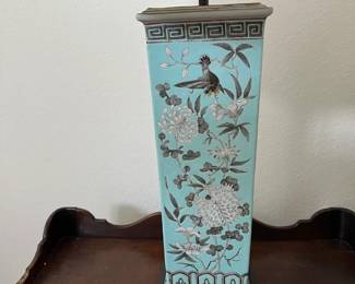 One of a pair of ceramic lamps with an Asian design.