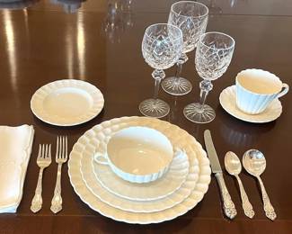 "Chelsea Wicker" by Spode 12 bread plates, 13 cream soup and under plates, 11 salad/dessert plates, 24 dinner plates, 12 cup/saucers, 24 demi tasse, Reed and Barton  silver plate flatware, "Lismore" by Waterford