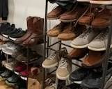 Many pairs of men's shoes size 12