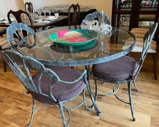 Stylish metal and glass dining set