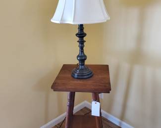 One of two brass lamps
Small square vintage oak table