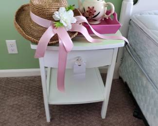 Shawnee teapot and straw hat on tray