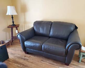 Small black leather sofa