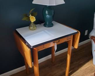 Porcelain drop leaf table