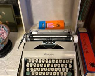 	#75	Olympia SM9 typewriter with case and paperwork	 $60.00 				