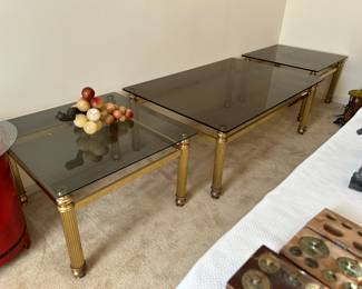#18	Brass and glass side table 27x17.5	 $20.00 				
#19 Brass and glass coffee table 47xx31x17.5	 $50.00 				
#20	Brass and glass side table 47x31x17.5	 $20.00 				