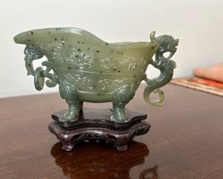 #25	Vintage Asian jade piece on wooden stand	 $200.00 				