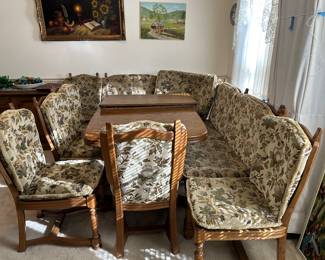	#47.   oak table with 2 leaves, 6 chairs and curved bench seating. 62-102x39x29	 $100.00 				
