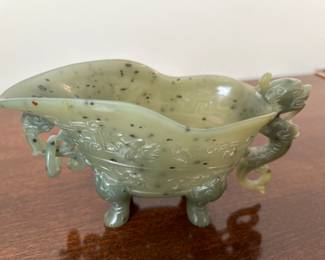 #25	Vintage Asian jade piece on wooden stand	 $200.00 				