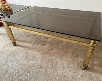 #19	Brass and glass coffee table 47xx31x17.5 $50.00 				
					