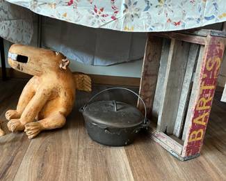 ceramic winged dog statue, cast iron dutch oven and vtg crate