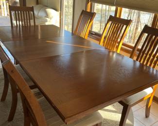 dining room table with 2 leaves and 6 chairs