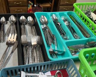 Two sets of flatware