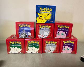 Pokémon Burger King collectibles with 23K gold plated cards inside. Some are still in packages.