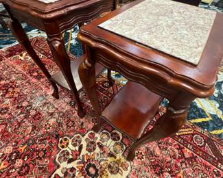 Pair of marble top tables