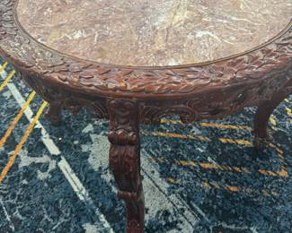 inlaid round marble table