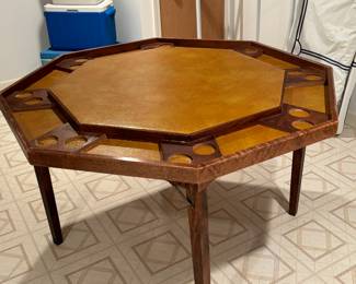 Poker table with top to turn it into a regular table 