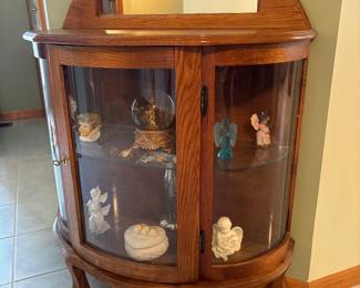 One of many oak display cabinets 