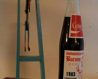 Vintage trapeze toy and coke bottle