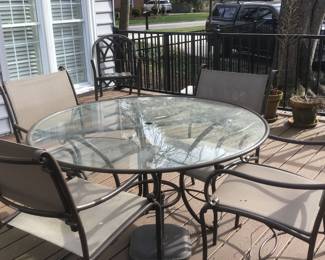 Round patio table with 4 chairs