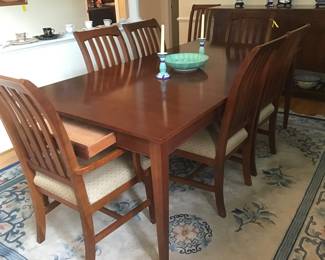 Ethan Allen “Impressions” dining room table with 2 leaves and 8 chairs